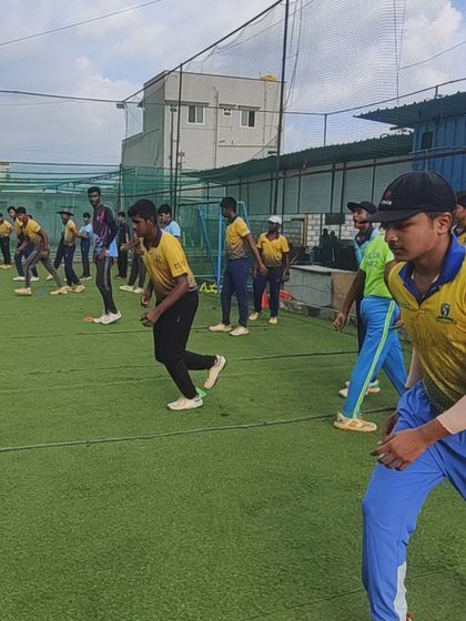 Players engaged in a dynamic warm-up. We ensure our athletes are properly warmed up to prevent injuries and maximize performance.