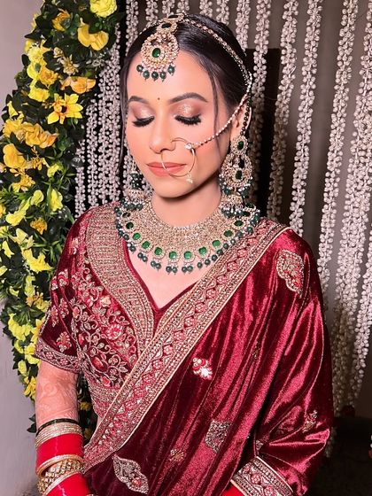 A close-up of Pratibha's eye makeup. The soft brown and gold tones make her eyes pop, while the flawless base gives her skin a healthy, radiant glow.