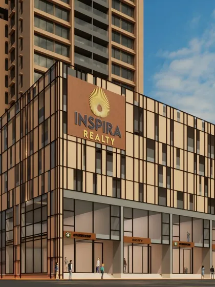 This view highlights the high-end retail section at the base of the Inspira Realty tower in Borivali. The design provides a vibrant, accessible street-level experience while seamlessly connecting to the residential tower above.