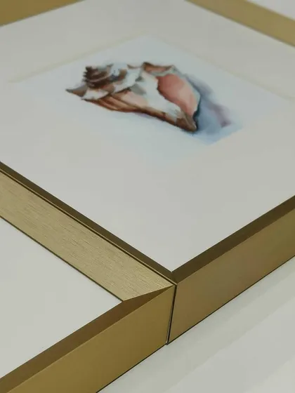 Our new satin Nara gold frames are an absolute favorite. They have a beautiful, soft finish that perfectly complements artworks and prints, especially when paired with a classic off-white mat.