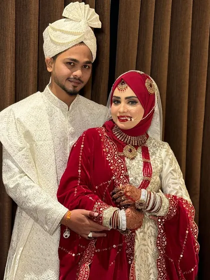 This royal couple looks picture-perfect. The bride's makeup is bold and beautiful, making her stand out while complementing her groom.