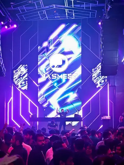 A look at a packed-out club night. Whether it's a wedding after-party or a public gig, my goal is always the same: keep the floor full and the energy high with a seamless mix of tracks.