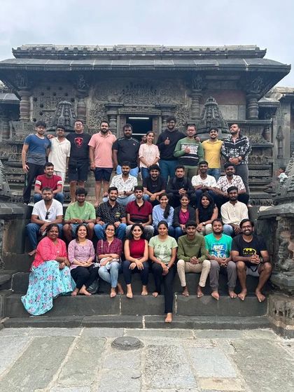 Our group posing in front of an ancient temple during the Gangadikal trek in the Chikmagalur district.