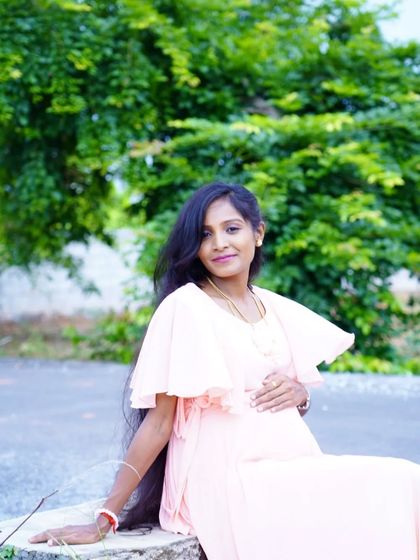 Another beautiful shot from Hema's maternity shoot, showcasing her long hair and the simple, elegant makeup I created for her.