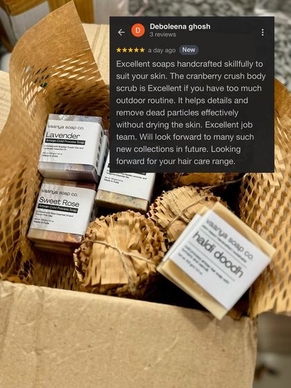 This image, featuring a 5-star review, also gives a great view of our plastic-free internal packaging, with soaps wrapped in paper and jars protected by honeycomb wrap.