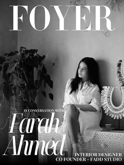 The black and white version of the Foyer Magazine cover, capturing a moment of reflection.
