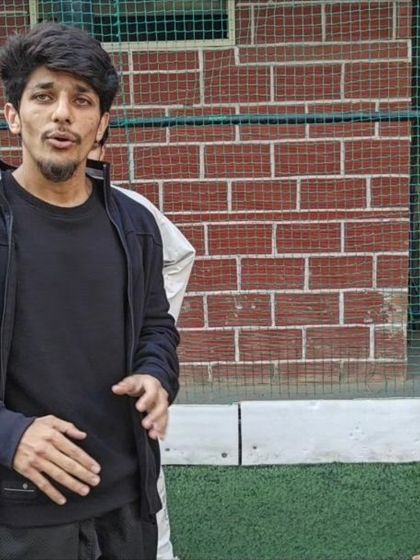 A shot of me coaching during a leg strength video shoot. I believe in giving clear, practical instructions that you can use to improve your own workouts.