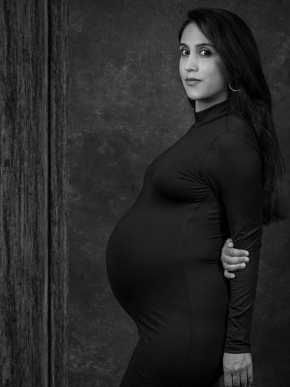 My labor story. I was naturally induced and used a birth ball, hot showers, and constant massage to manage the contractions. I focused on one contraction at a time and stayed as relaxed as possible.