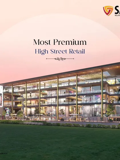 An evening view rendering of Saya Piazza, highlighting its status as a "Most Premium High Street Retail" destination. The warm lighting and modern design create an inviting atmosphere for shoppers.