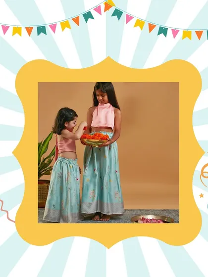 A sweet moment between sisters in their beautiful festive lehengas. I curate a wide range of ethnic wear so you can find the perfect outfit for any celebration.