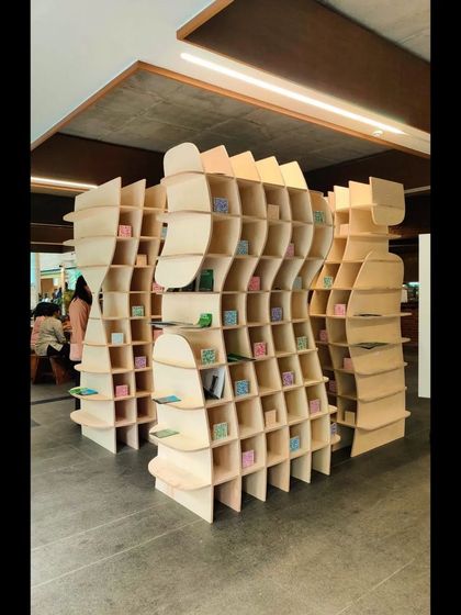 The fluid, sculptural forms of 'Stradata' create a dynamic spatial experience for visitors. The installation was designed as a 'cellular device' for both superficial contact and experiential transit.