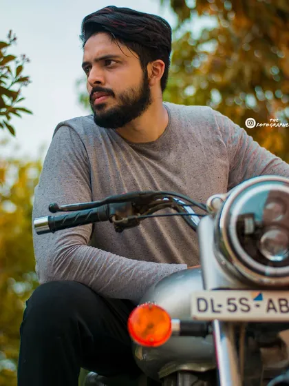 A more pensive, candid-style shot from the same series. This adds variety and a different mood to the lookbook.
