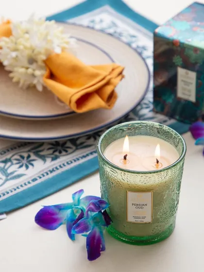 Set the mood for an intimate dinner with our Persian Oud candle. The rich, mystical fragrance adds a layer of sophistication to your tablescape, creating a memorable dining experience for your guests.