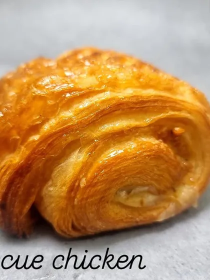 A savory Barbecue Chicken Croissant. The smoky and sweet barbecue chicken filling is a delicious contrast to the buttery, flaky pastry.