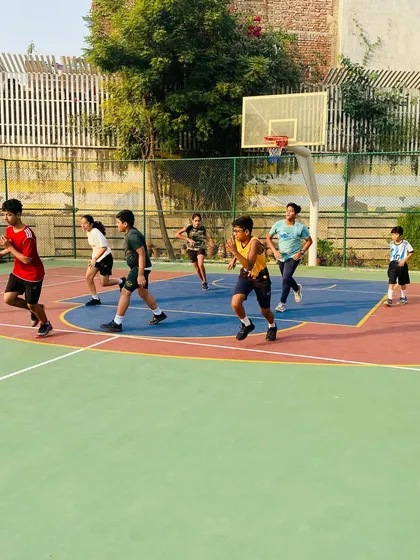 Players run a fast break, a key part of our up-tempo style.