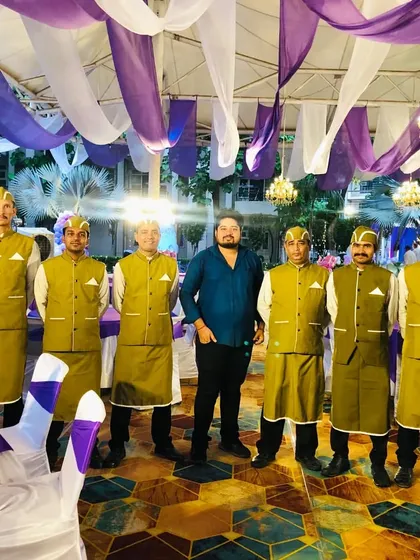 Our founder with the service team at a private celebration. We take pride in our hands-on approach and the dedication of our staff, who are the backbone of our success.
