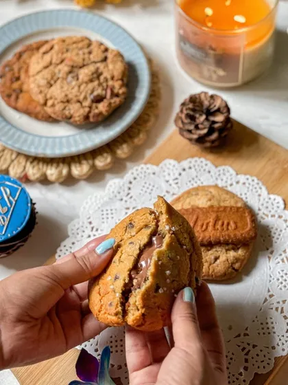 A box of four gourmet chunk cookies for Father's Day, with flavors like Biscoff, Nutella Sea Salt, and a sugar-free oatmeal option. It's the perfect treat to share with Dad over coffee.