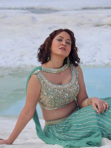 The versatility of our lehengas, looking just as good seated as they do standing.