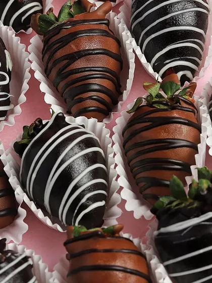 A close-up of my winter special chocolate-covered strawberries. Each one is a little piece of art.