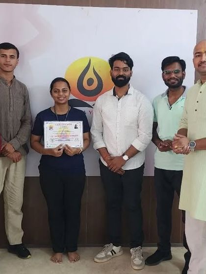 Our instructors stand proudly with a new batch of certified yoga teachers. We are committed to providing high-quality training that prepares our students for success.