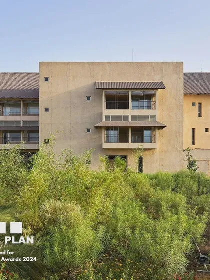 The award-shortlisted JSW Sanjeevani Hospital in Dolvi, nestled within its natural landscape. Our design aimed to create a healing environment that feels connected to the earth, using natural materials and ensuring green views from every part of the building.