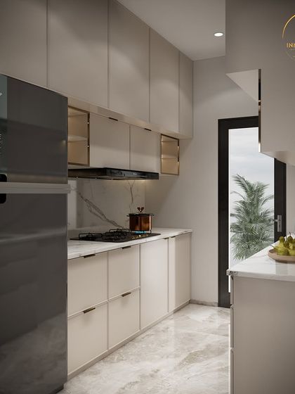 A sleek and modern parallel kitchen design. The space is optimized for efficiency, with handleless cabinets, a built-in hob, and a large refrigerator, all tied together with a clean, neutral color palette.
