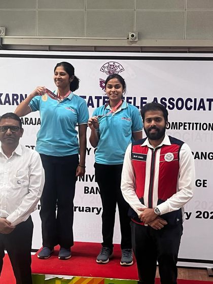 Rohita and Rishika on the podium after their medal wins in the 25M junior event.