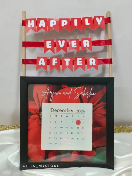 A personalized "Happily Ever After" frame with the couple's name and wedding date, a centerpiece for my wedding day hamper.