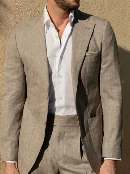 Experience effortless elegance with our custom linen suits. Perfect for warmer weather, this suit combines a relaxed feel with a sharp, tailored structure. We bring a curated selection of premium linens to your home, helping you design the ideal summer wardrobe.