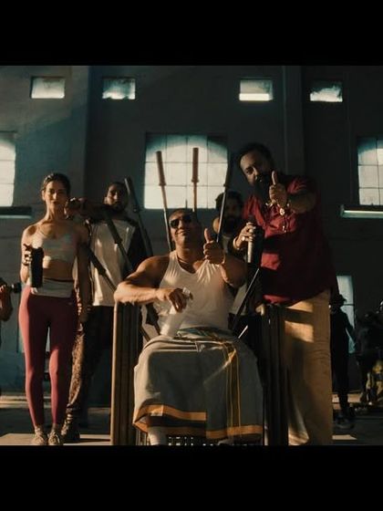 The final triumphant shot from the Muscleblaze ad, with the entire cast styled in a mix of athletic wear and South Indian-inspired outfits.