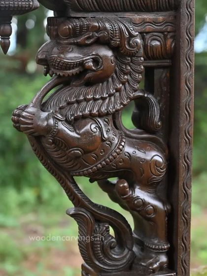Another detailed shot of the Yaazhi bracket, capturing the intensity of its expression and the fine craftsmanship of the carving.