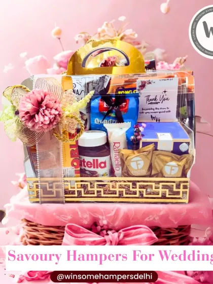 A savory and sweet hamper for a wedding celebration. This gift basket combines treats like Nutella and Raffaello with other snacks, presented beautifully against a floral backdrop.