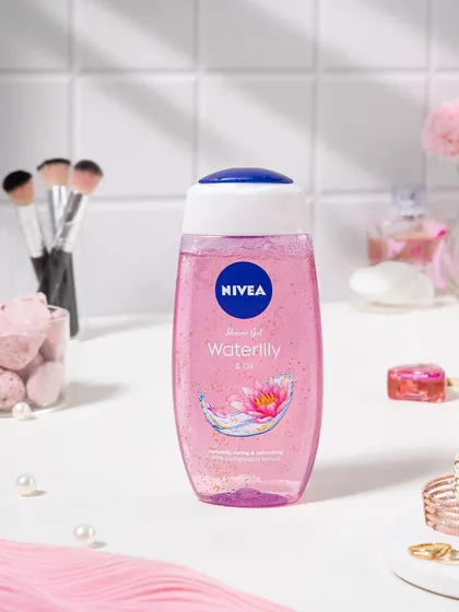 For Nivea's Waterlily shower gel, I created a soft, feminine bathroom vanity scene. The pink tones, pearls, and makeup brushes help position the product as part of a luxurious self-care routine.