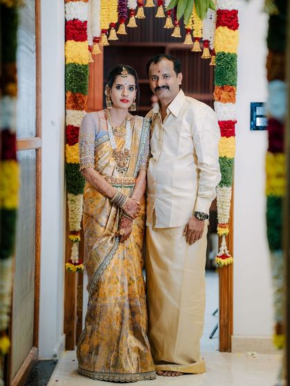A picture-perfect family celebrating their housewarming. I had the pleasure of dressing my client Archana in a hand-worked blouse, her husband in a custom shirt, and their son in a charming Kalamkari kurta.