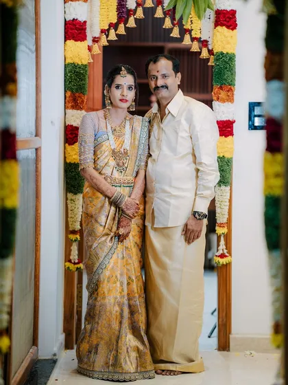A picture-perfect family celebrating their housewarming. I had the pleasure of dressing my client Archana in a hand-worked blouse, her husband in a custom shirt, and their son in a charming Kalamkari kurta.