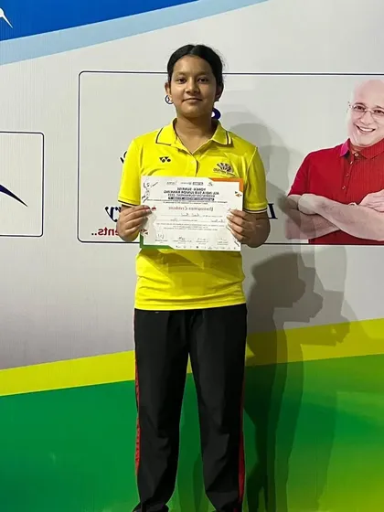 Aanya Bisht proudly displaying her certificate after winning a bronze medal at the Yonex-Sunrise All India Sub-Junior Ranking Tournament in Vijayawada.