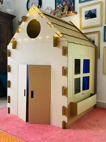 See how our large playhouse fits perfectly into a child's room. Before the paint, it's a sturdy, eco-friendly fort, reading nook, or secret clubhouse, ready for adventure.