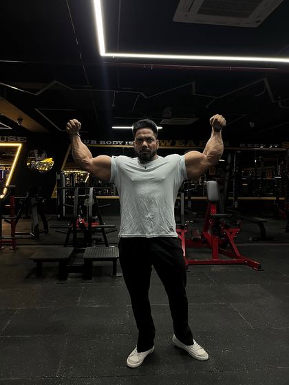 Dreams without action is just sleep. A powerful front double bicep pose.