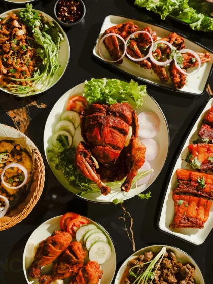 A glimpse of the variety I offer. This spread includes a whole fried chicken, crispy pork, spicy chicken preparations, and fresh salads, perfect for a family meal or a special celebration.