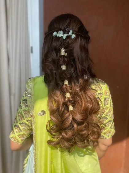The back view of the butterfly and braid hairstyle, a whimsical and romantic choice.