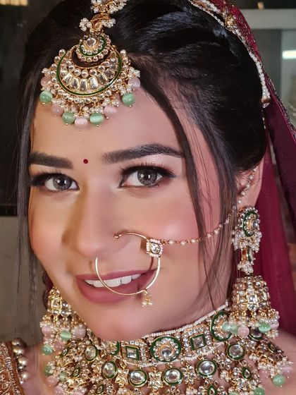 A confident and beautiful bride, looking straight into the camera.