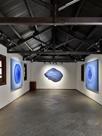 The Batley Gallery, a former kitchen block, was readapted into a modern exhibition space. We exposed the original wooden roof trusses and combined them with contemporary track lighting to create a space that honors its history while serving a new function.
