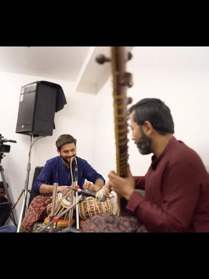 The setup for our baithak, with cameras and microphones ready to capture the musical exchange between me and sitarist Ayan Sengupta.
