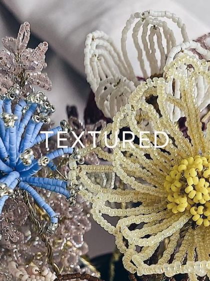 A close-up look at the texture and detail of our FLORAA collection. Each bead is carefully placed to ensure every color complements the others, creating a magical, one-of-a-kind piece.