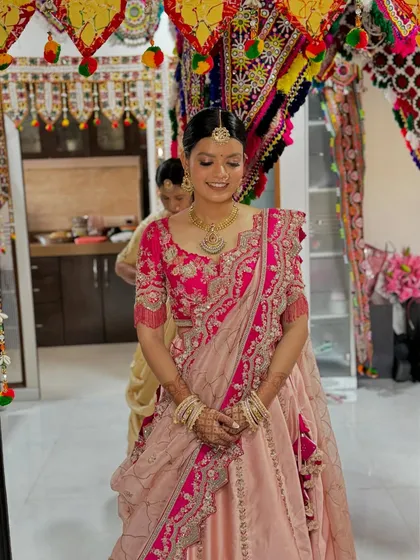 A candid moment of the bride's bhabhi during the wedding festivities.