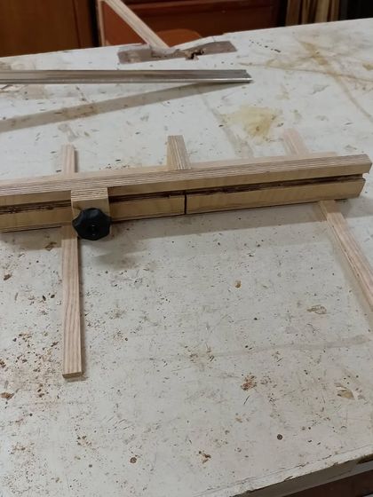 A mini crosscut sled I made for my table saw. This jig allows for safe and accurate cross-grain cuts, especially on small pieces.