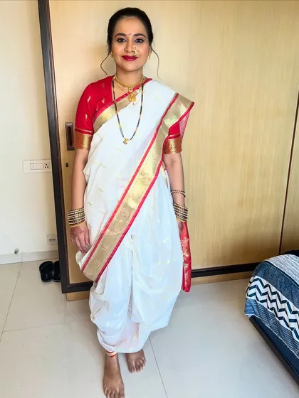 A full-length view of the traditional Marathi Nauvari saree draping I did for my client. The entire look is perfect for festive ceremonies.