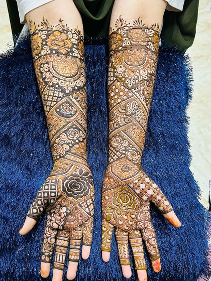 Another view of this stunning engagement mehendi. The design is dense and intricate, perfect for a grand celebration.