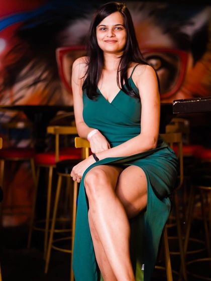 A guest posing at the bar.