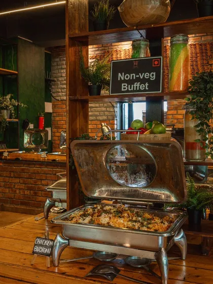 A shot of the non-veg buffet, featuring a delicious chicken biryani that's perfect for refueling your team.